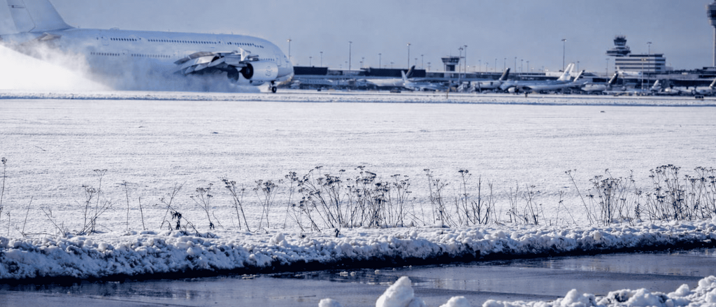 Snowy Schiphol with A380 taxiing
